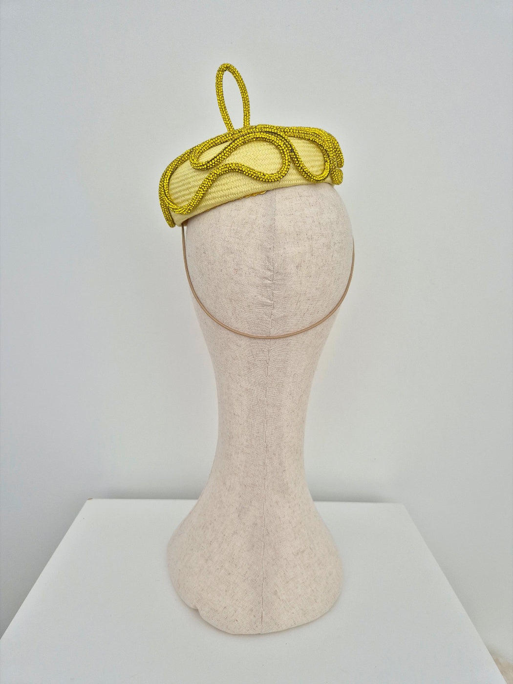 yellow button beret headpiece with rhinestone trim back view