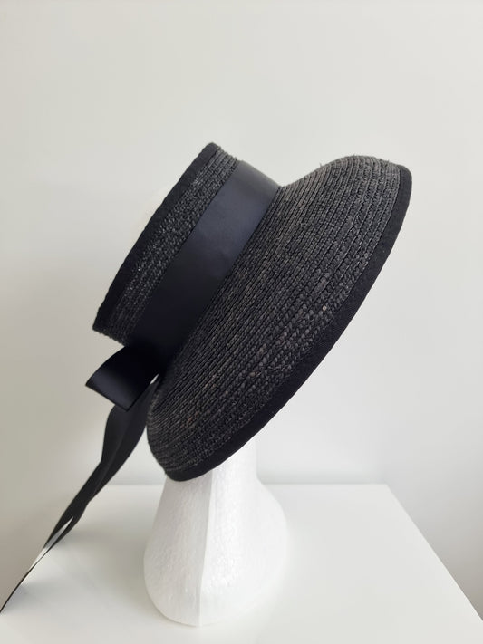 black straw topless hat with bow and tails