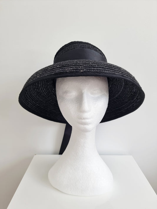 black straw topless hat with bow and tails