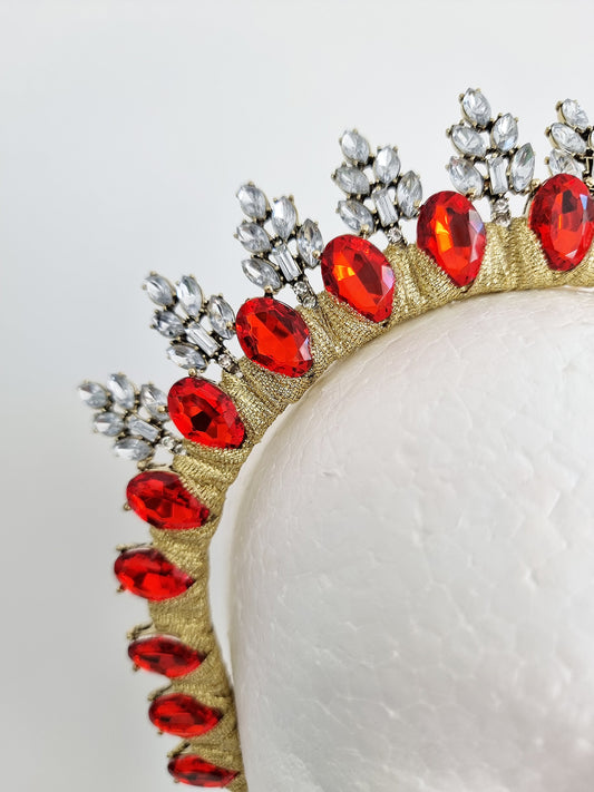 red rhinestone headpiece close up